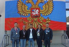 Сборная РБ на фоне флага России